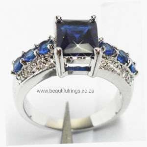 Beautiful 14kt white gold GP and simulated sapphire ring.