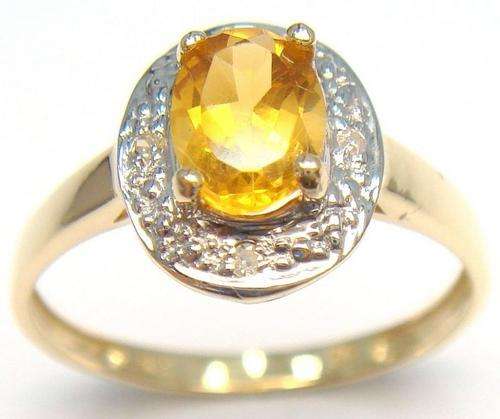 Beautiful solid 10kt gold and genuine citrine and diamond ring.
