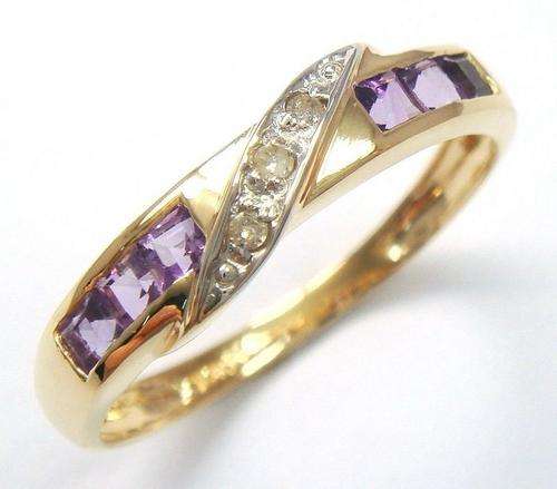 Beautiful solid 10kt gold and genuine amethyst and diamond ring.