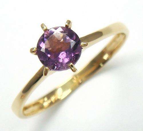Beautiful solid 10kt gold and genuine amethyst ring.