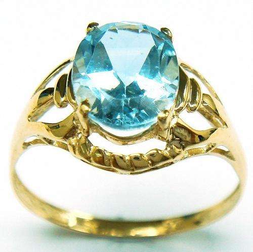 Beautiful solid 10kt gold and genuine blue topaz ring.