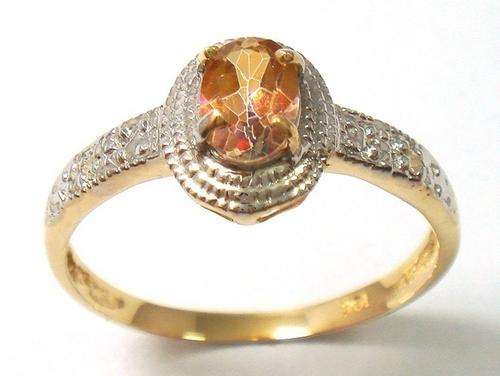 Beautiful solid 10kt gold and genuine yellow mystic topaz and diamond ring.