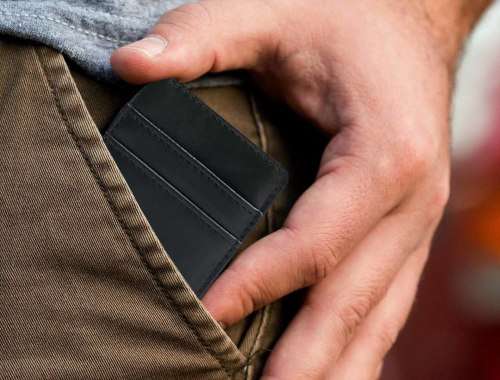 Black flip magic wallet with elastic band