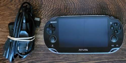 PS Vita Console with Charger and 8GB SD Card