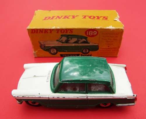NEAR MINT AND BOXED NO 189 TRUIMPH HERALD FROM MECCANO DINKY, ENGLAND. NOT LESNEY. NOT CORGI.