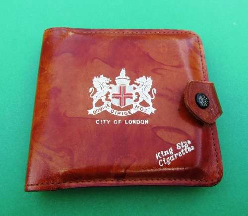 GENUINE LEATHER FOLDING CIGARETTE CASE FROM LONDON, ENGLAND.