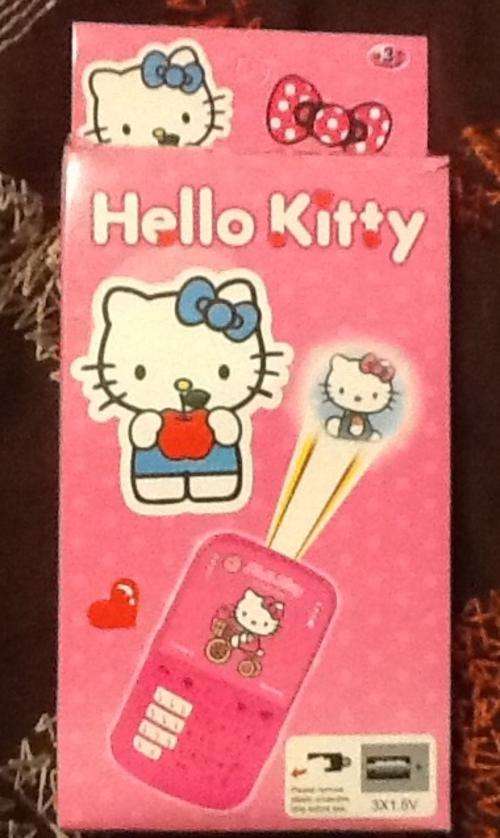 Hello kitty pretend cellphone with torch that makes kitty light - great party favor