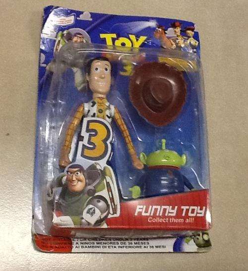 Toy story -  woody 14cm and alien -packaging bit damaged - great cake topper