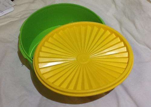 Tupperware bowl - green with yellow lid - 9cm  high