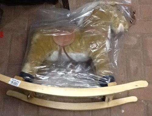 Brown rocking horse - - excellent price -  new - few scratches on bottom - was R350
