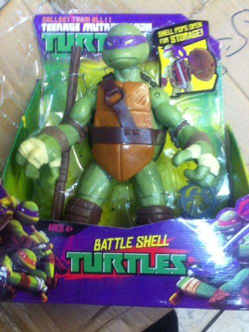 reduced Ninja turtles moveable plastic figurine 27cm - with weapons - shell pops open - purple