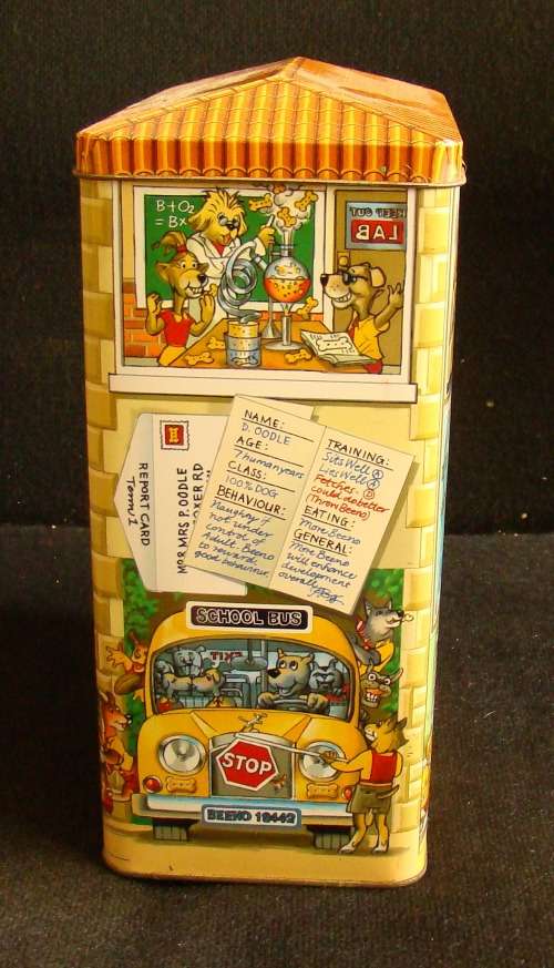 Nibbles cat and Beeno Eaton College biscuit tins