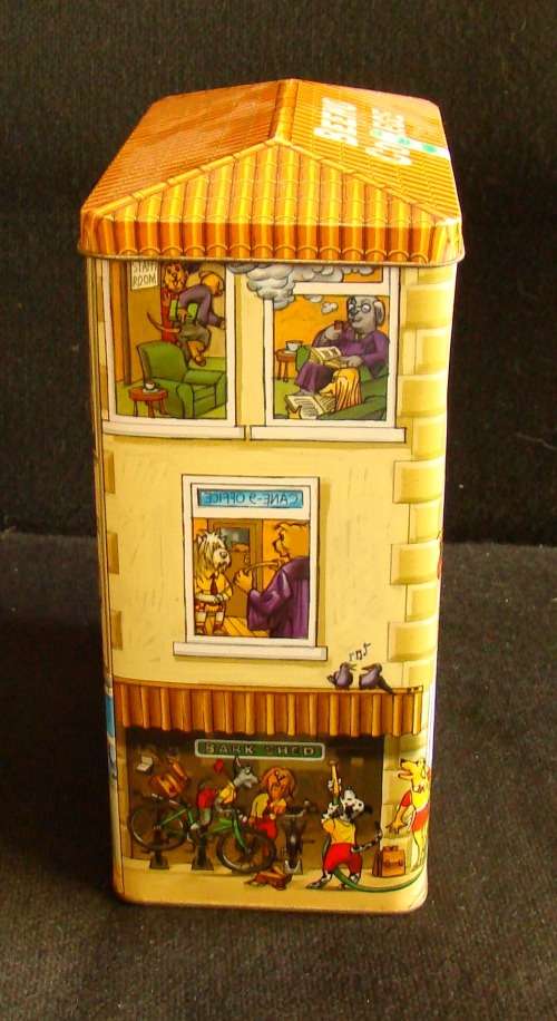 Nibbles cat and Beeno Eaton College biscuit tins