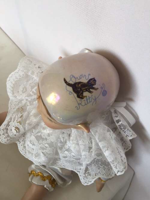 Medium Porcelain Pixi doll dressed in white coloured suite - Artist JR 1999