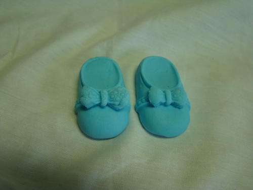 Edible blue baby shoe cake decorations
