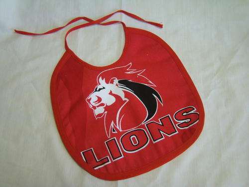 Lions rugby baby bib  ---- No stains on bib- the print has shadows!!!!!!!!!!