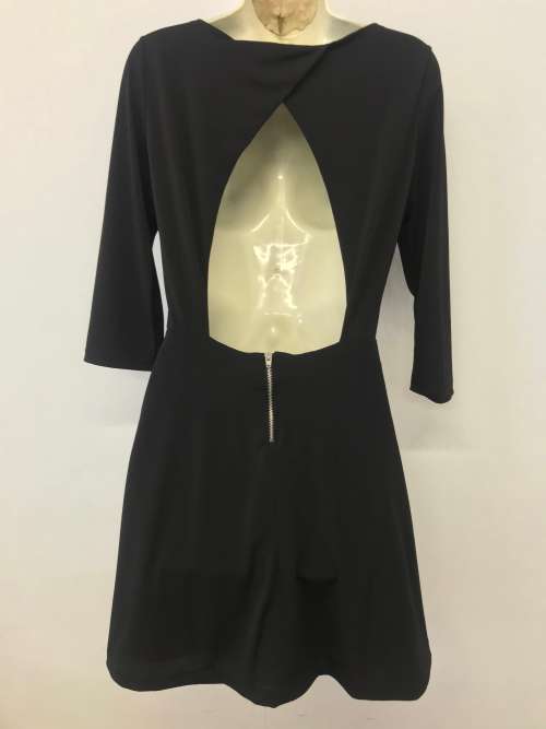 Suits 12 / 36 designer is MANGO  stunning black dress with cut out A-Line.