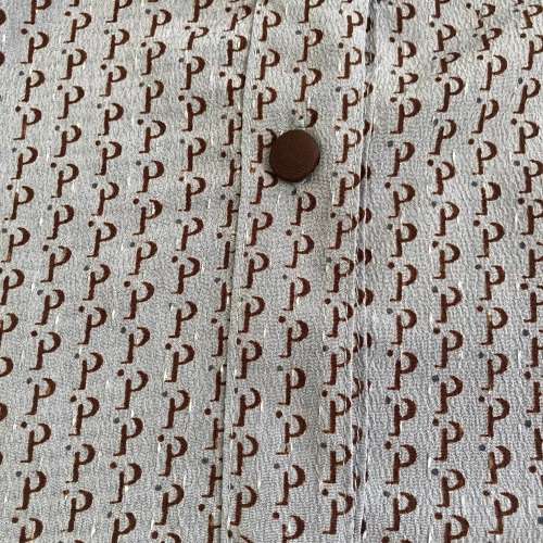 Made in ITALY frill neckline with beautiful fabric must be seen. Suits a 34