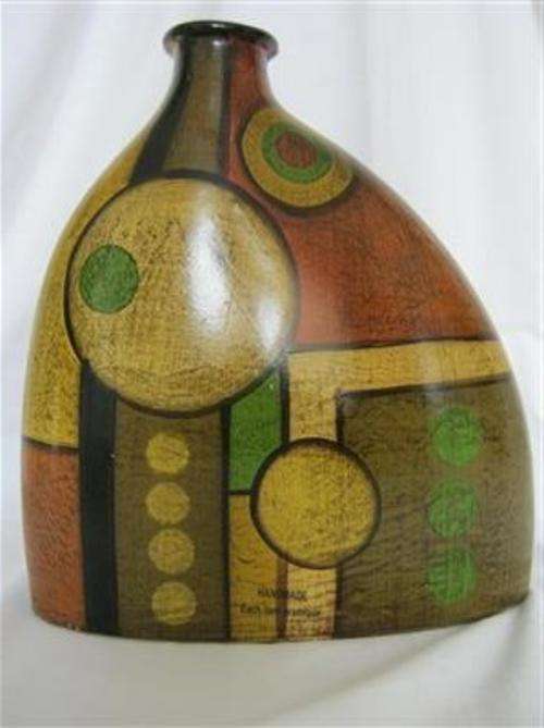 HAND MADE CERAMIC VASE..28.30cm HIGH X 26cm WIDE AT THE BASE X 10cm WIDTH OF BASE..