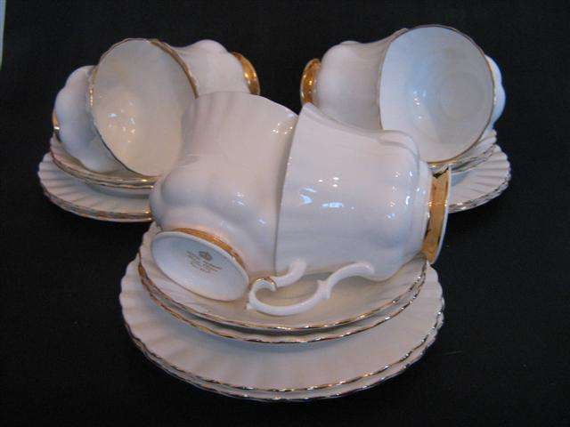 ROYAL ALBERT BONE CHINA  SET..CONSISTING OF 6 TRIOS.. ARTIC WHITE ..PATTERN " VAL D' OR "