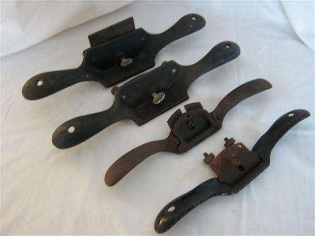 FOUR SPOKE SHAVERS / SCRAPERS..