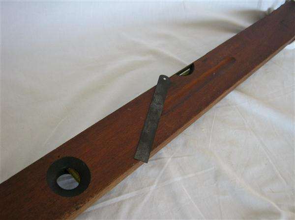 BRASS AND HARDWOOD SPIRIT LEVEL..AND SMALL METAL RULER....