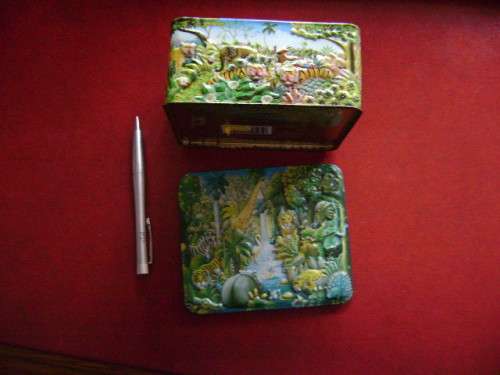 Embossed tin  with animal jungle features  (14 x 12 x 6 cm)