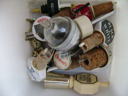 Vintage spirit pourer: J & B   (material: ceramic + metal parts)