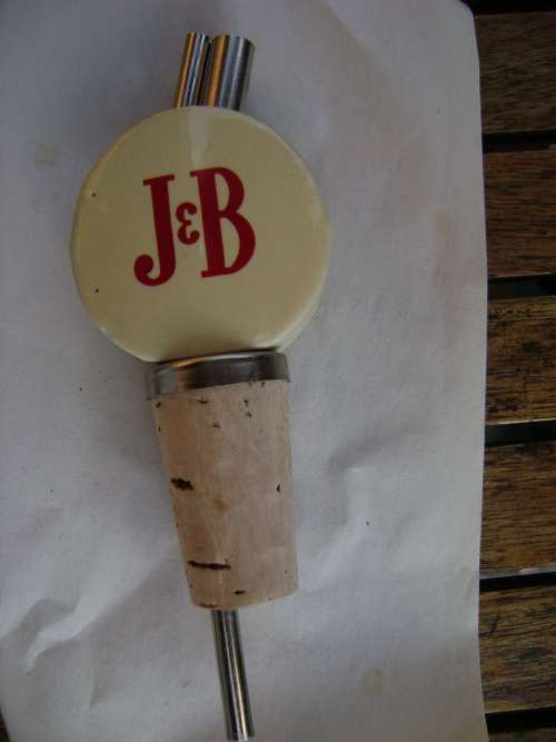 Vintage spirit pourer: J & B   (material: ceramic + metal parts)