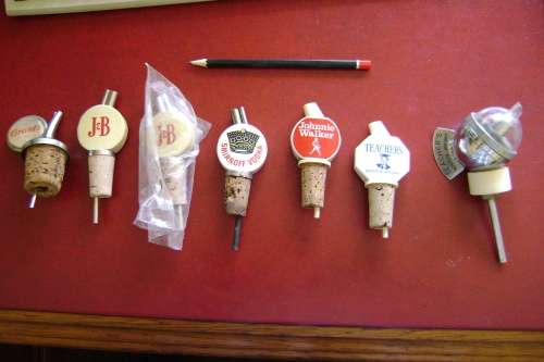 Vintage spirit pourer: J & B   (material: ceramic + metal parts)