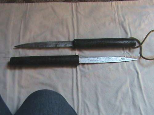 Baton with double dagger blades