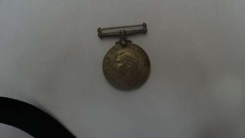 Medal to PM Oberholzer WW2