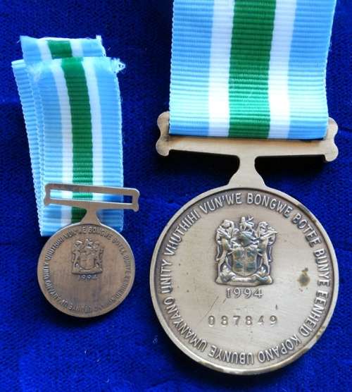 ## Unity Medal to O/Kpl JA Herbst with Miniature Medal ##