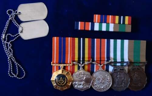 ## 5 Medal Group to Cmdt JR Fowler with Sertificates ##