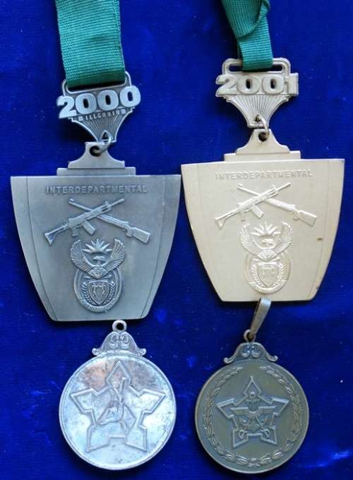 ## 4 Silver & Bronz Shooting Medals ##