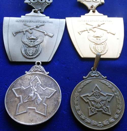 ## 4 Silver & Bronz Shooting Medals ##
