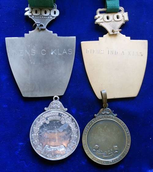 ## 4 Silver & Bronz Shooting Medals ##