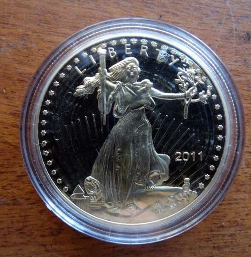 2011 United States of America 1 Ounce Fine Gold Token. (Not  Coin)