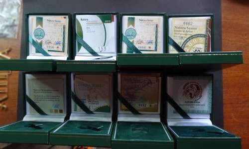 8 Empty 1/10th Natura Boxes with COA