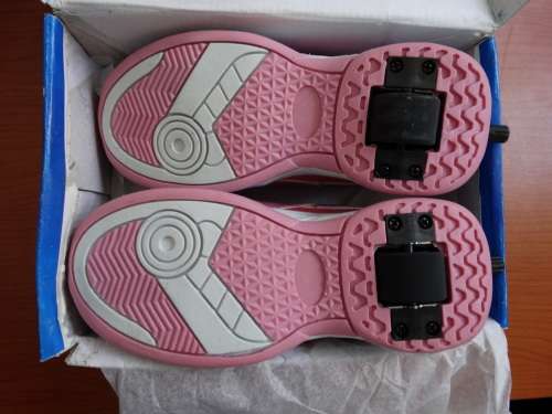 2 in 1 Wheelie Shoes Color Pink. Fits 5 -7 year old Size 3
