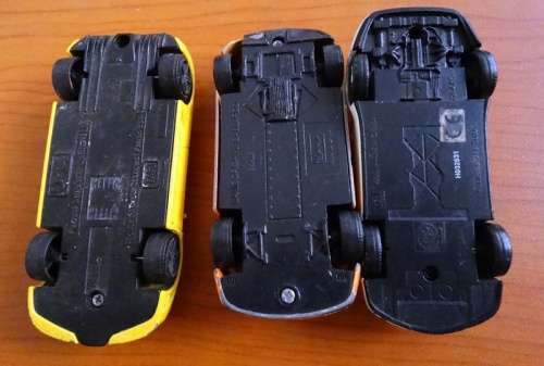 2 Bburago and 1 Uni Die Cast cars