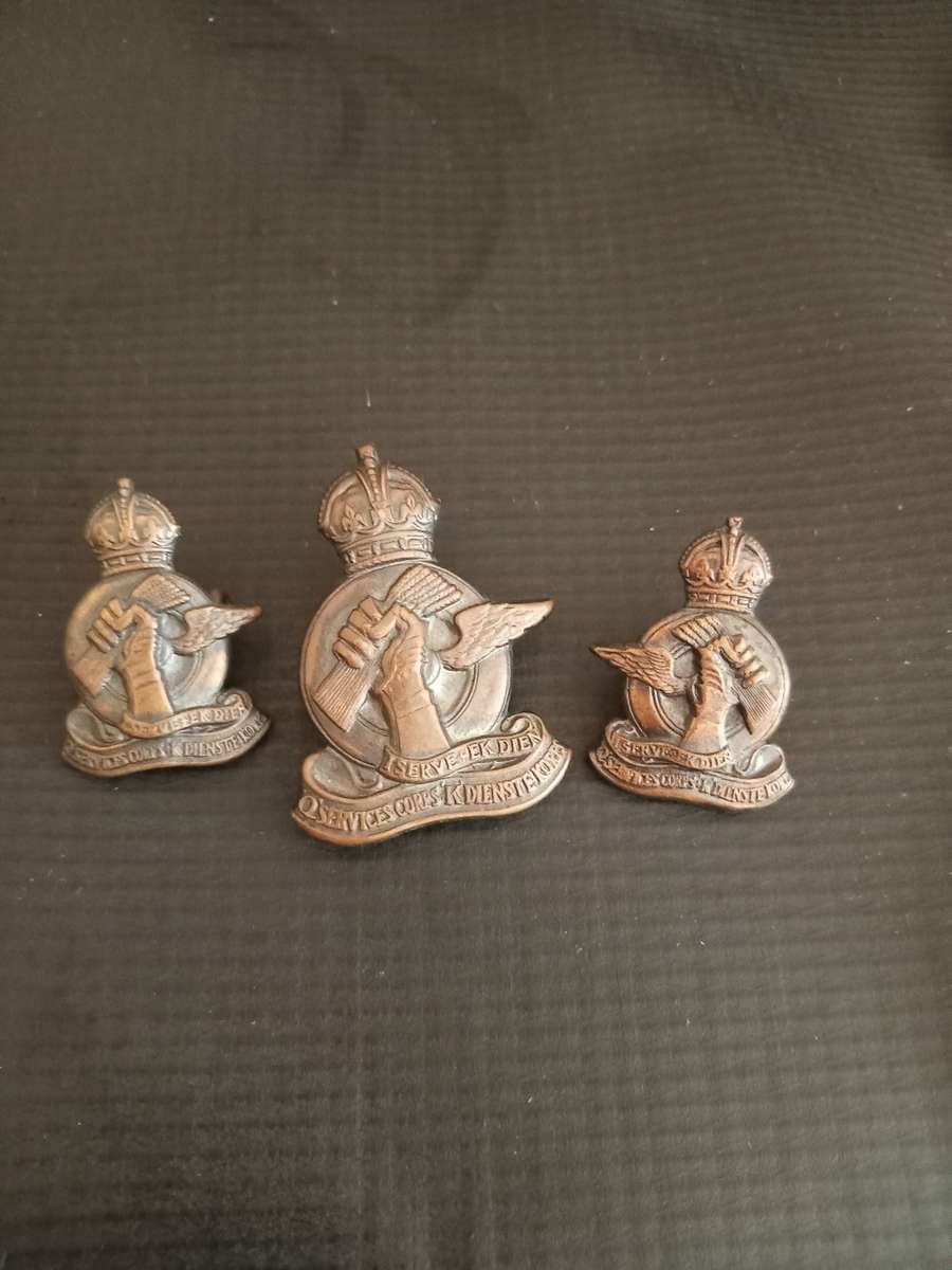 Services Corps Shoulder and Cap Badges. See description