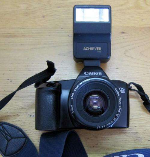 ## Canon EOS 1000 35-80mm Camera With Flash ##