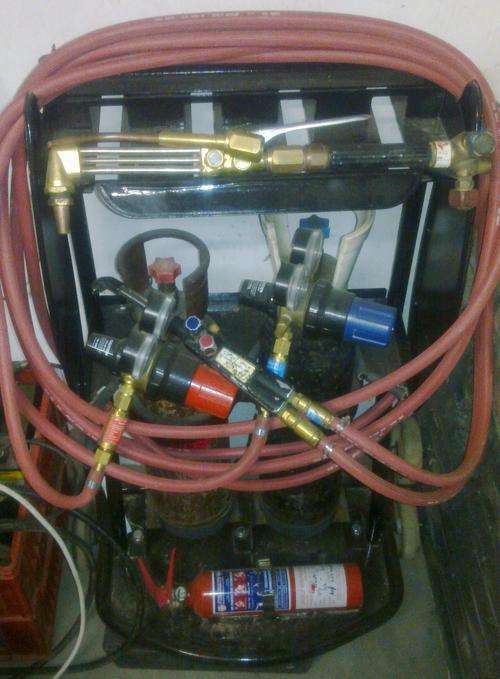 Afrox portapack with 2 deual regulators and extra cutting and brazing tortch and mixer on troley
