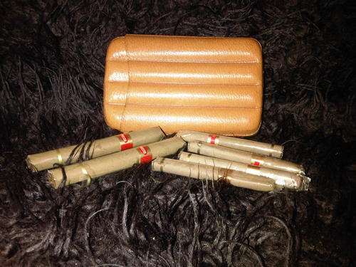 PIGSKIN CIGAR HOLDER