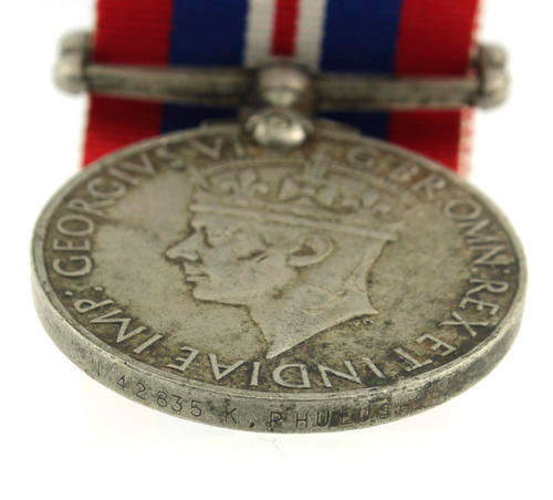 War Medal 1939 - 1945 awarded to a South African named WWII VF