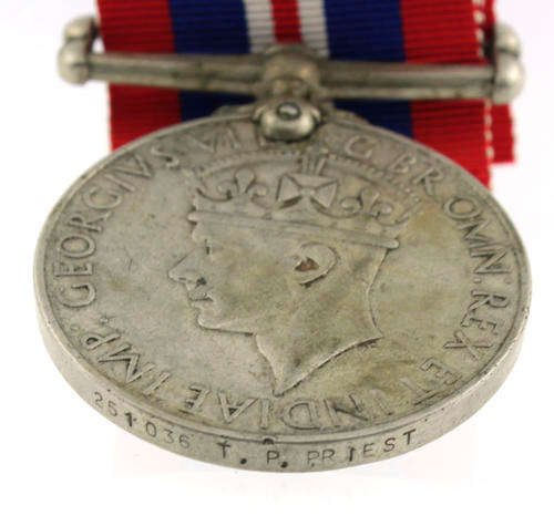 War Medal 1939 - 1945 awarded to a South African named WWII