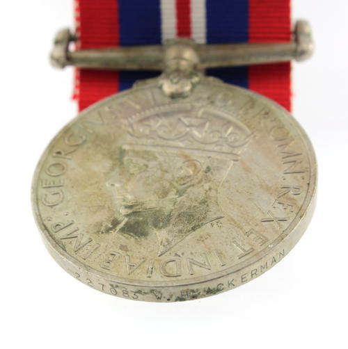 War Medal 1939 - 1945 awarded to a South African named WWII