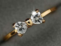 YELLOW GOLD PLATED BOW WITH SIMULATED DIAMONDS RING SIZE 7