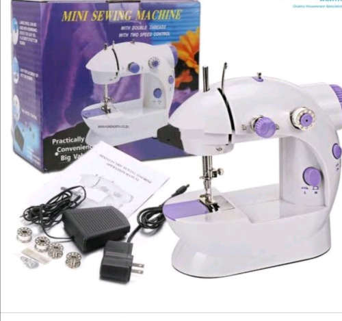 MINI SEWING MACHINE - NEW & SEALED IN BOX